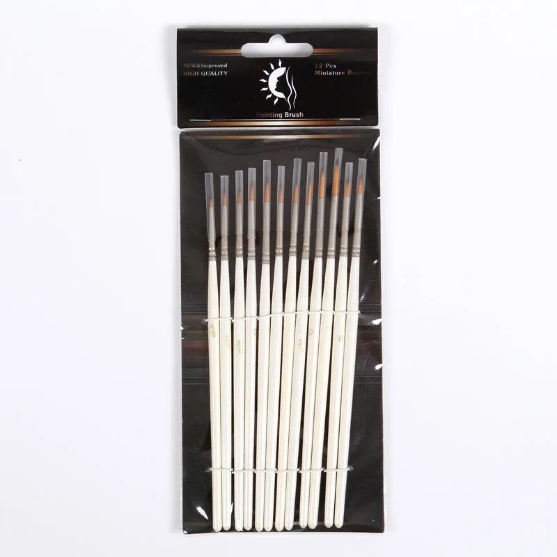 Set of twelve pearl white fluorescent marker pens with nylon wool brush tips for artists.