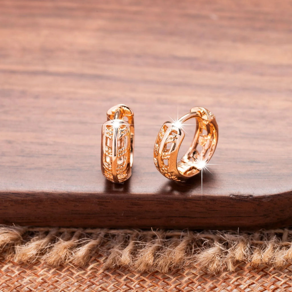 Rose gold plated copper earrings with hollowed leaf and heart designs