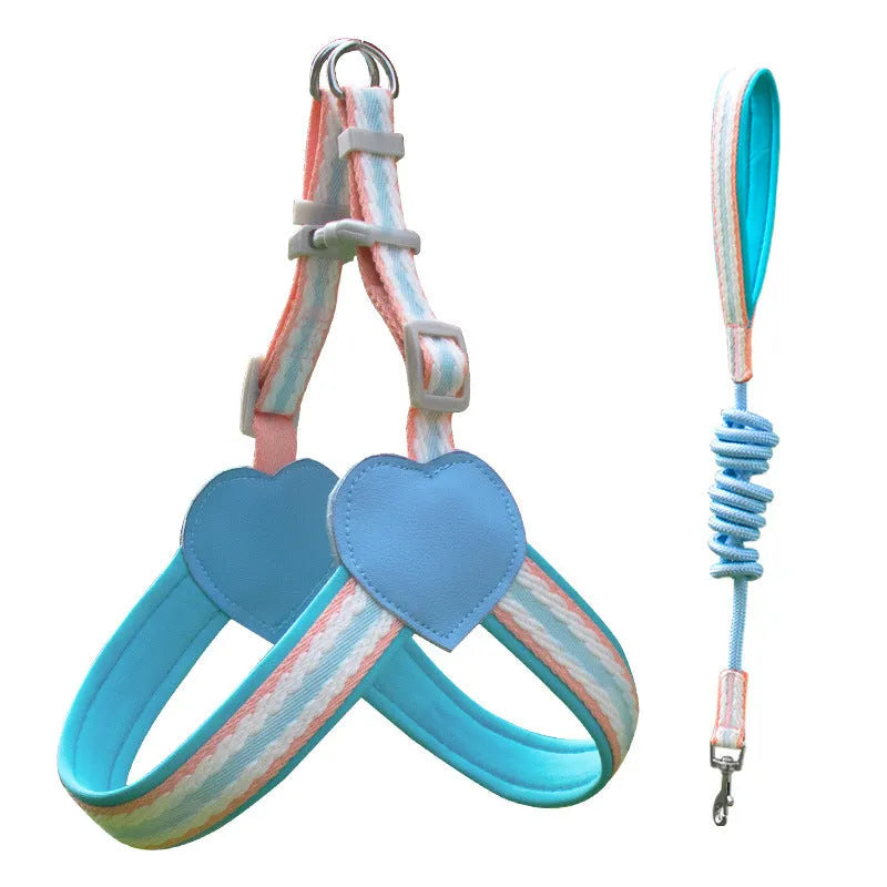 Nylon dog walking chest strap vest with integrated hand-holding rope in emerald green, shown on a medium-sized dog.