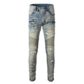 Light blue men's slim fit distressed jeans with hand-frayed details and a straight leg cut.