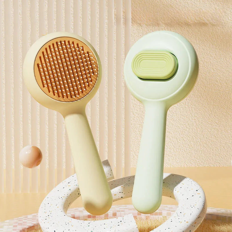 Green pet grooming brush with stainless steel teeth and non-slip handle