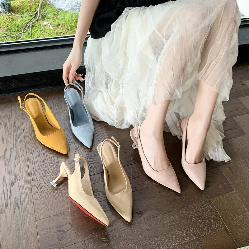 Women's apricot suede pointed toe stiletto heels on white background