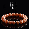 Natural old mine rhodochrosite round bead bracelet with ruyi elements, available in 6mm or 8mm bead sizes.