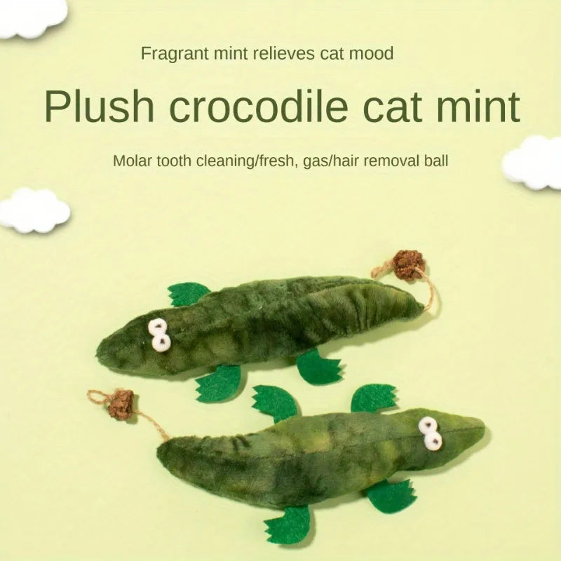 Green plush alligator catnip toy with natural peppermint scent for feline oral cleansing