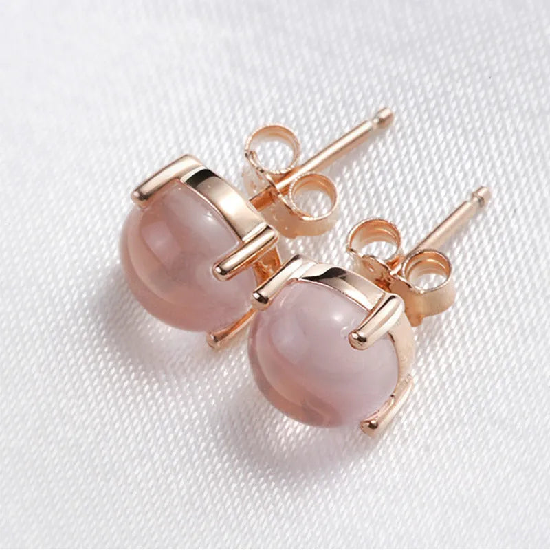 Women's rose gold drop shape stud earrings with synthetic ross quartz crystal inlay, Korean-style minimalist design