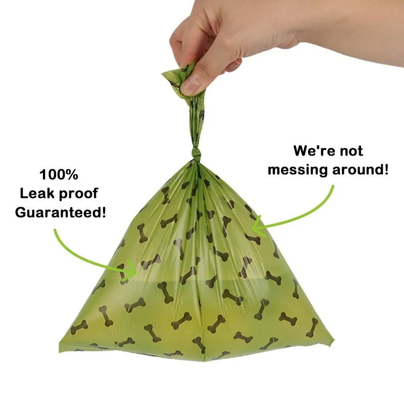 Military green degradable dog waste bags with black bone print measuring 23 by 33 centimetres