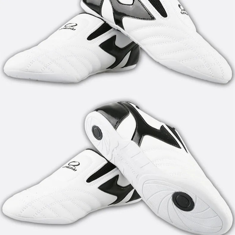 Black and white children's martial arts training shoes with soft bottom and widened design