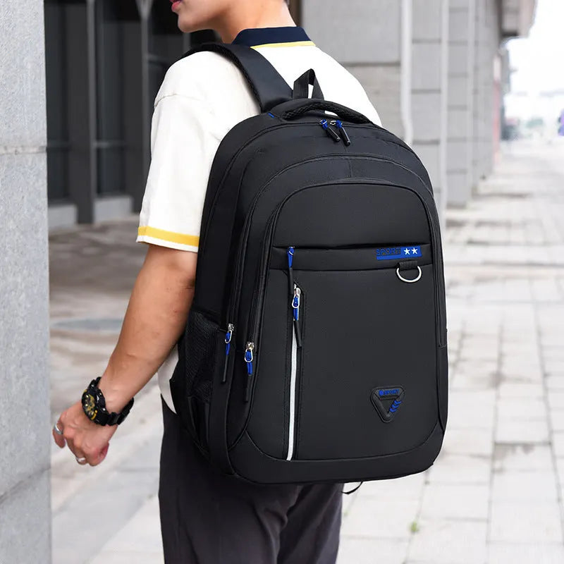 Men's Oxford cloth schoolbag with letter pattern in four colour options showing large capacity design