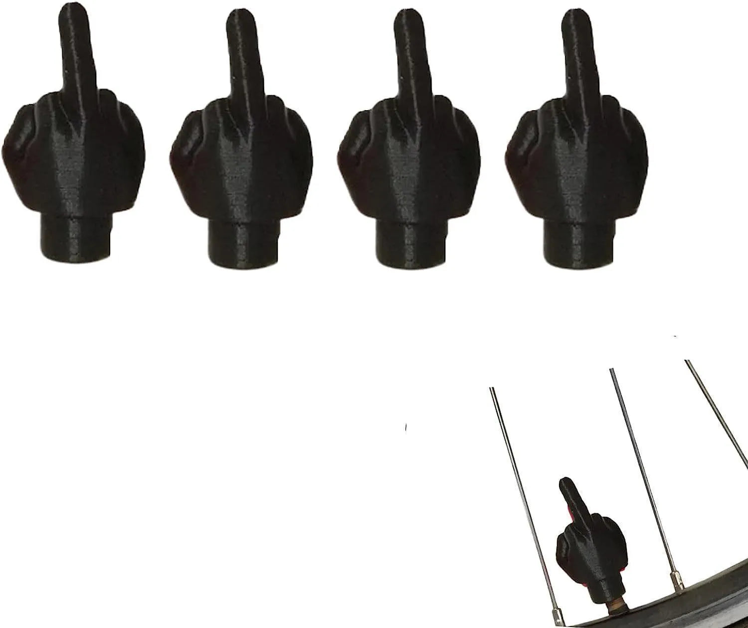Eight car tyre valve caps, four black and four skin colour, made from latex.