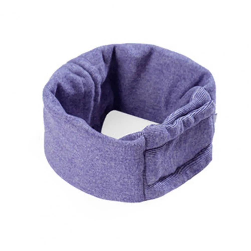 Dog wearing black calming hoodie covering ears with hair protection and scarf function