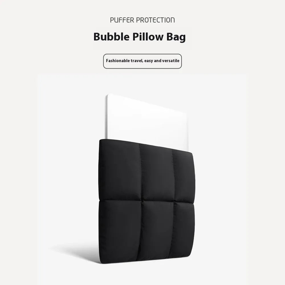 Soft fluffy black polyester laptop sleeve for a 15.6 inch laptop with visible stitching.