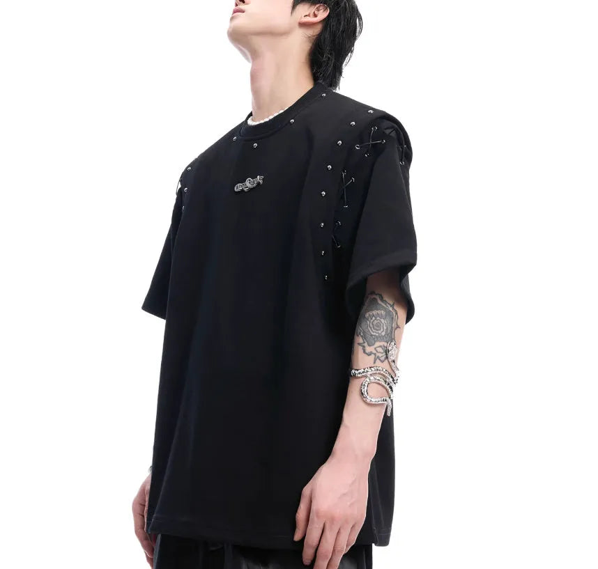 Black deconstructed lace-up cutout short sleeve t-shirt on a hanger