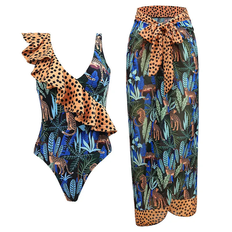 Women's solid colour one-piece swimsuit with thin spaghetti straps and a matching detachable skirt.