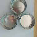 A mini stainless steel egg steamer shown in both round and heart-shaped design variations.
