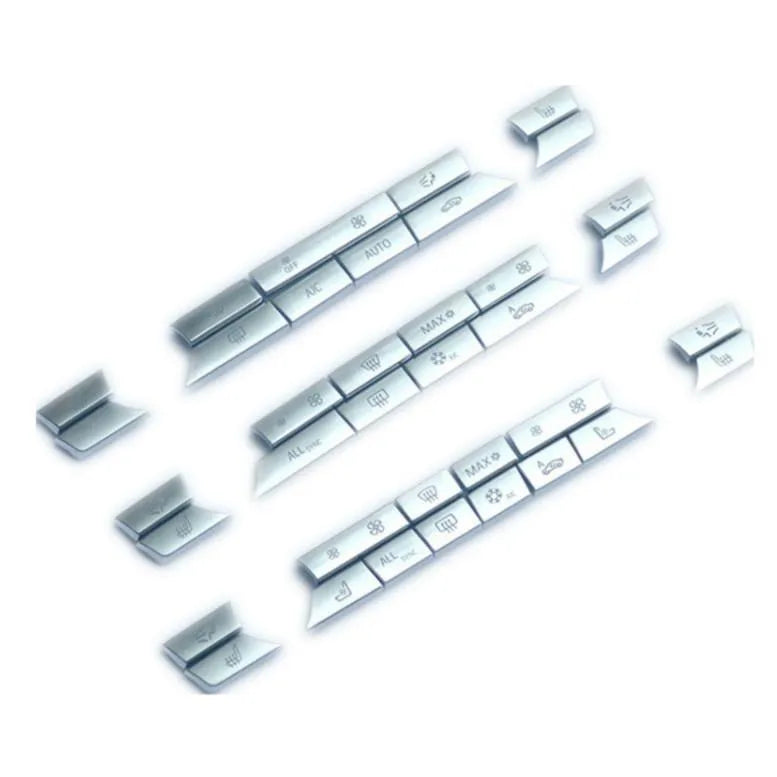 Silver car dashboard air conditioner button panel replacement set for climate control.
