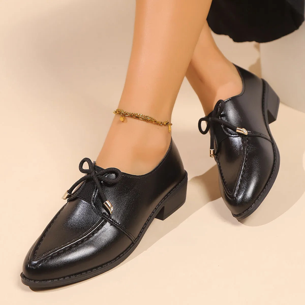 Women's simple leather-look shoes with a decorative bow on the front, showing choice of big bow or small bowknot designs.