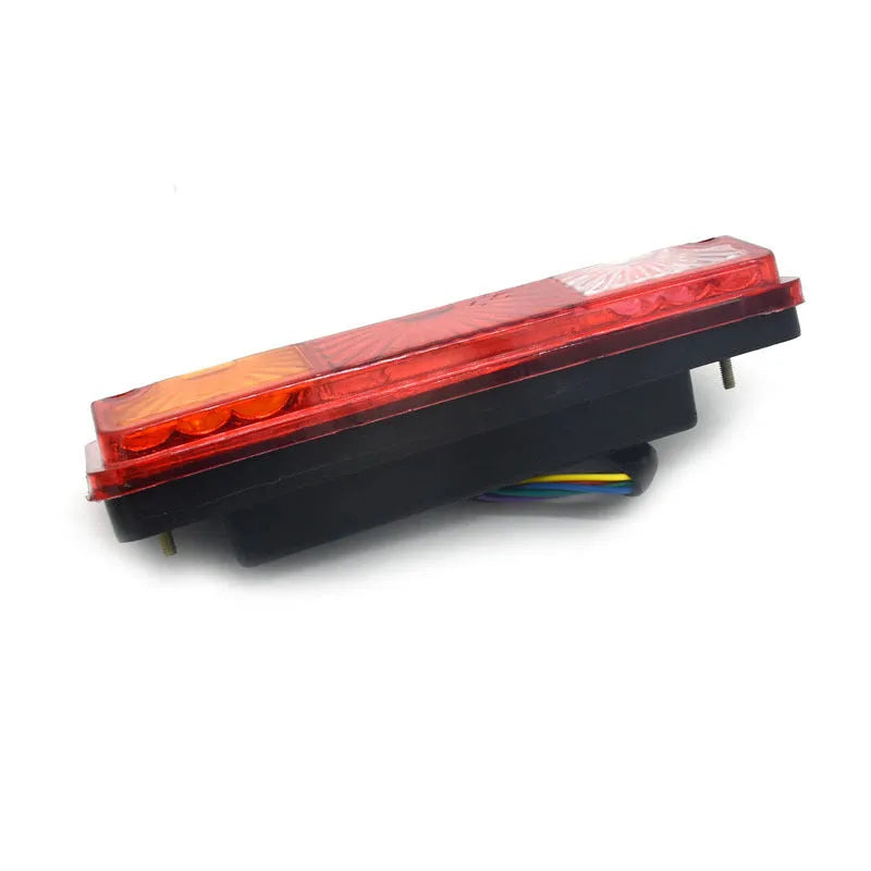 Black semi-closed taillight for tricycles with dual 12V and 48-60V voltage options.