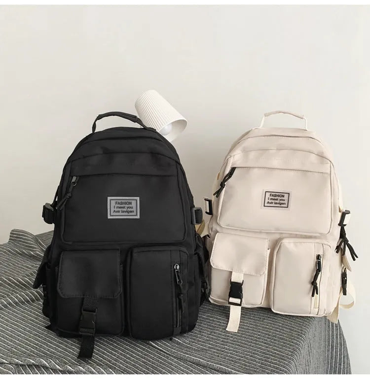 Soft black and white student backpack with laptop compartment and 3D pocket