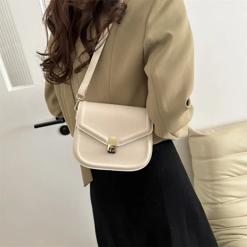 Soft PU clamshell messenger bag in horizontal square design shown in black colour