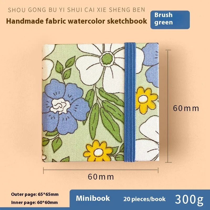 Feiluniao handmade fabric watercolour sketchbook with decorative cover, shown at 185mm length.