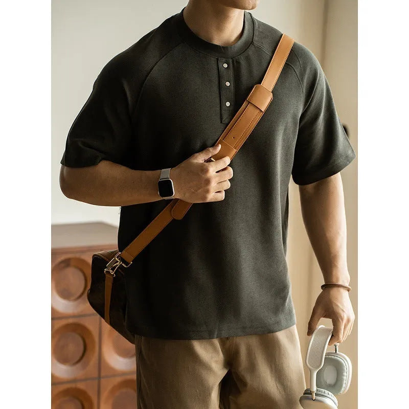 Casual loose top with raglan sleeves in terry texture fabric, shown in neutral colours