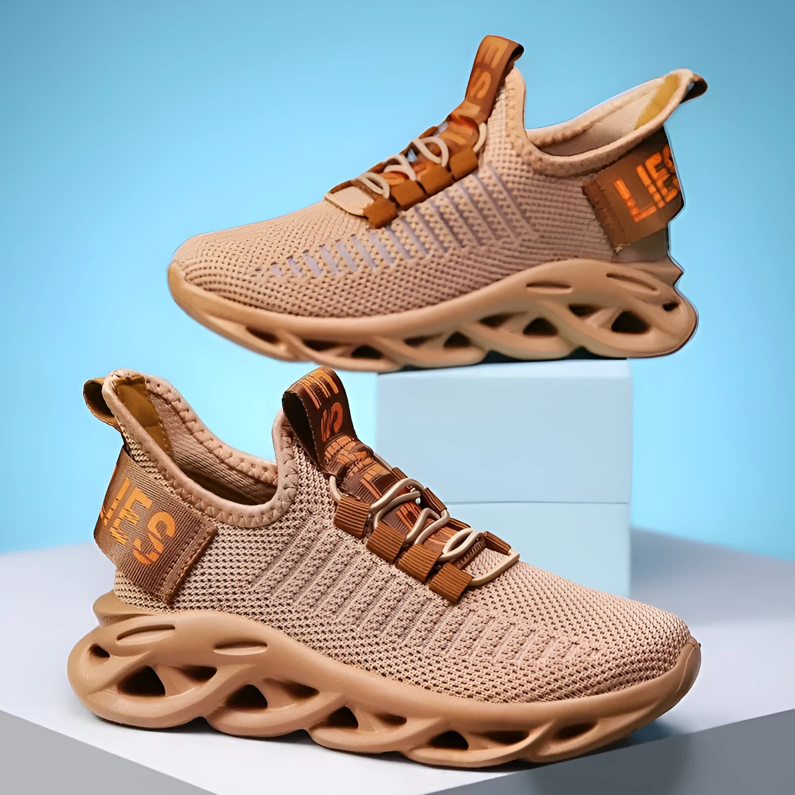 Children's Velcro sneakers in black, khaki, or white with fabric upper and textured sole.