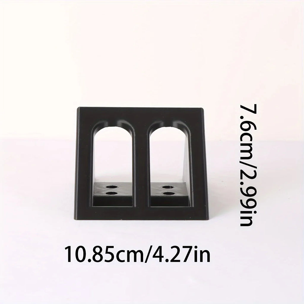 Black punk-style plastic pistol display stand for collectible airsoft pistols and models.