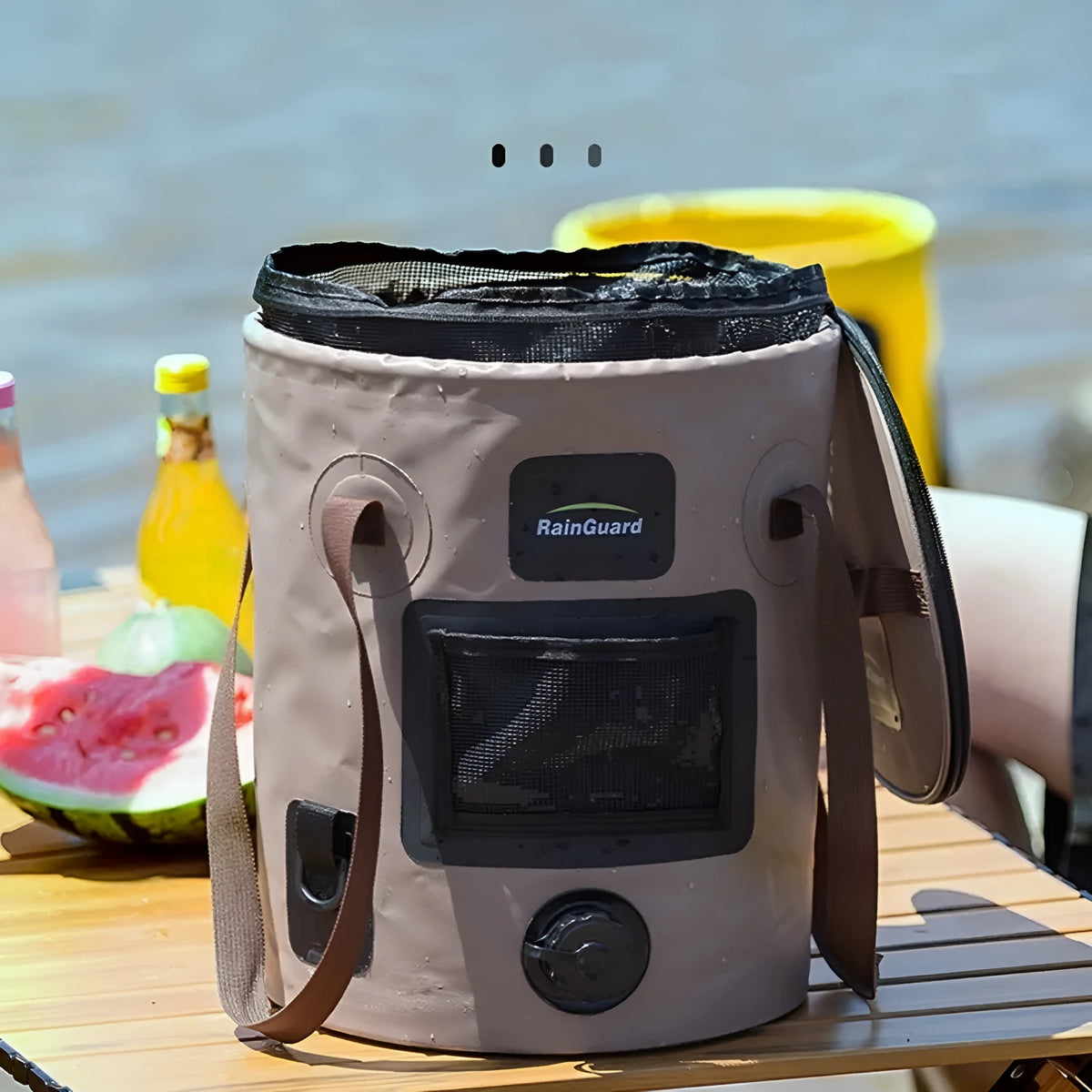 Portable folding fishing bucket in various colours with 25 litre capacity and optional mesh net pocket