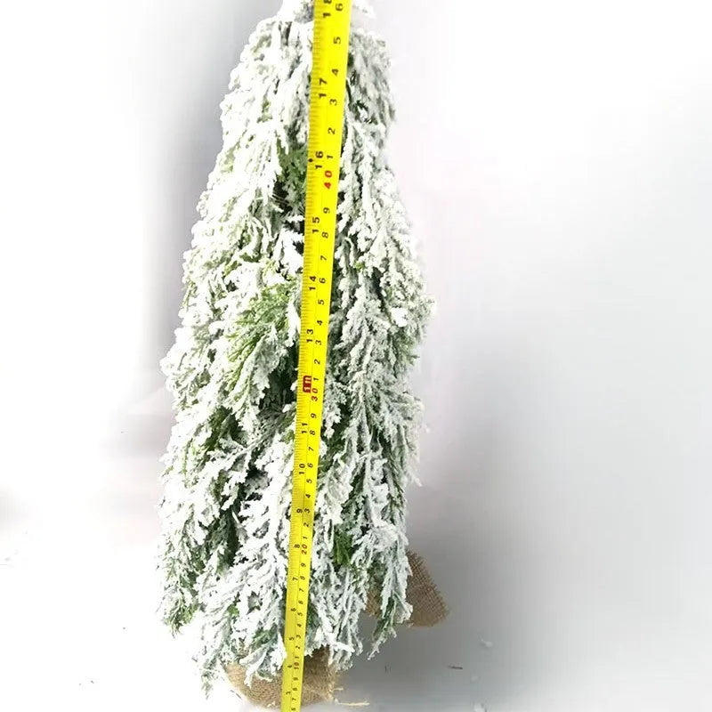 24 inch artificial Christmas tree sprayer with lights on desktop