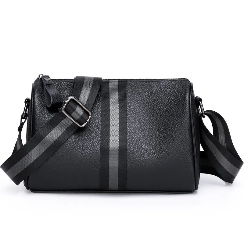 Black genuine leather one-shoulder crossbody bag showing its large size and polyester lining.
