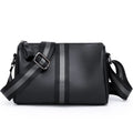 Black genuine leather one-shoulder crossbody bag showing its large size and polyester lining.