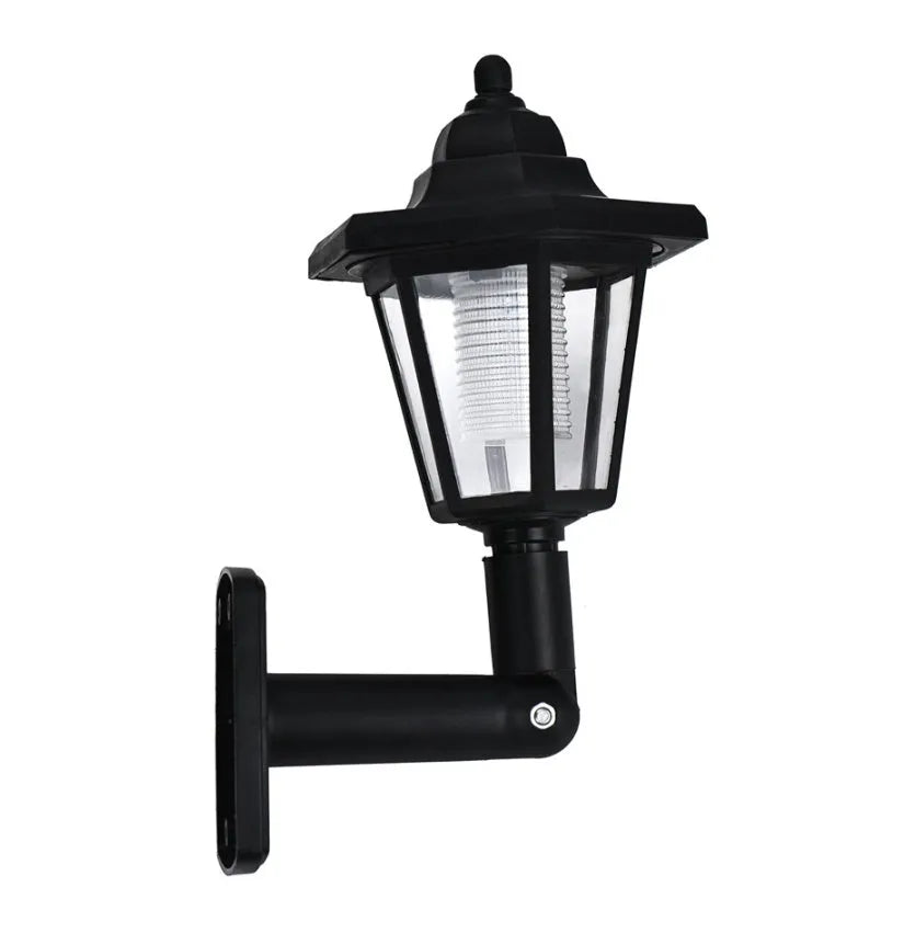 Black hexagonal solar-powered LED wall light with light sensor for outdoor garden use
