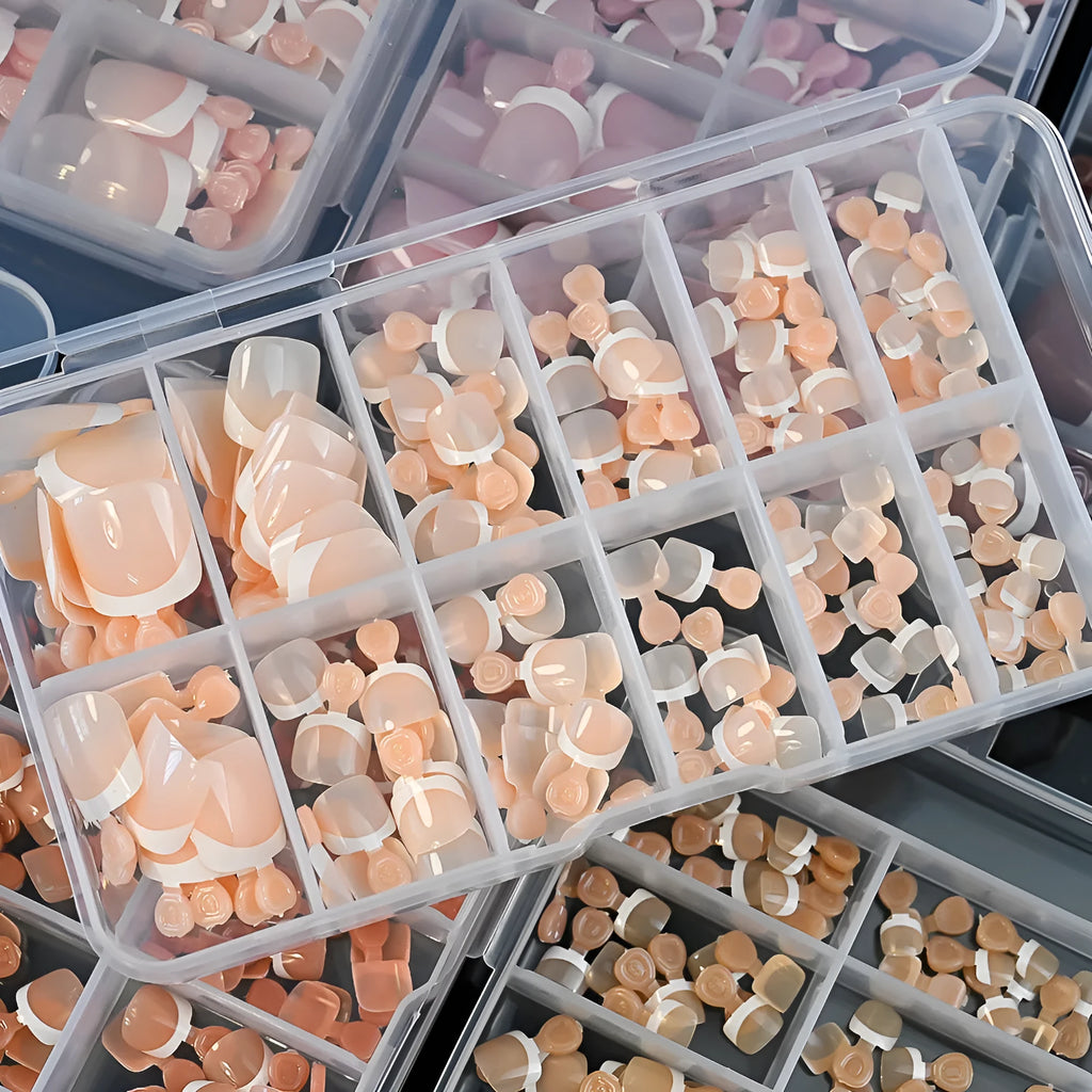 Box of 120 French white tip artificial toenails in nude colours, square short shape.