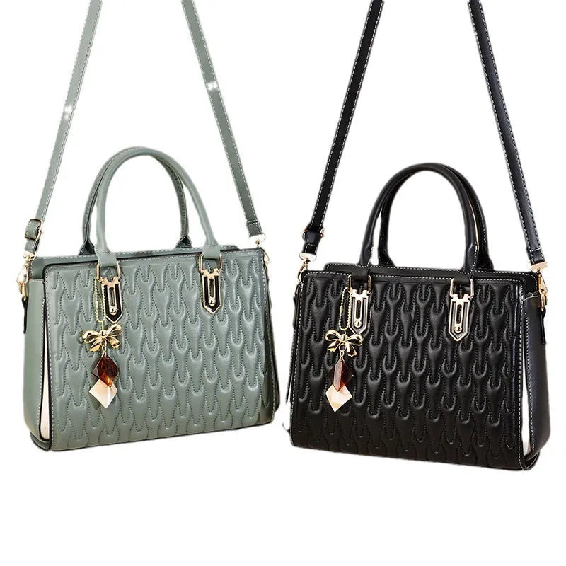Women's large capacity polyester messenger bag in street trend style with organisational compartments