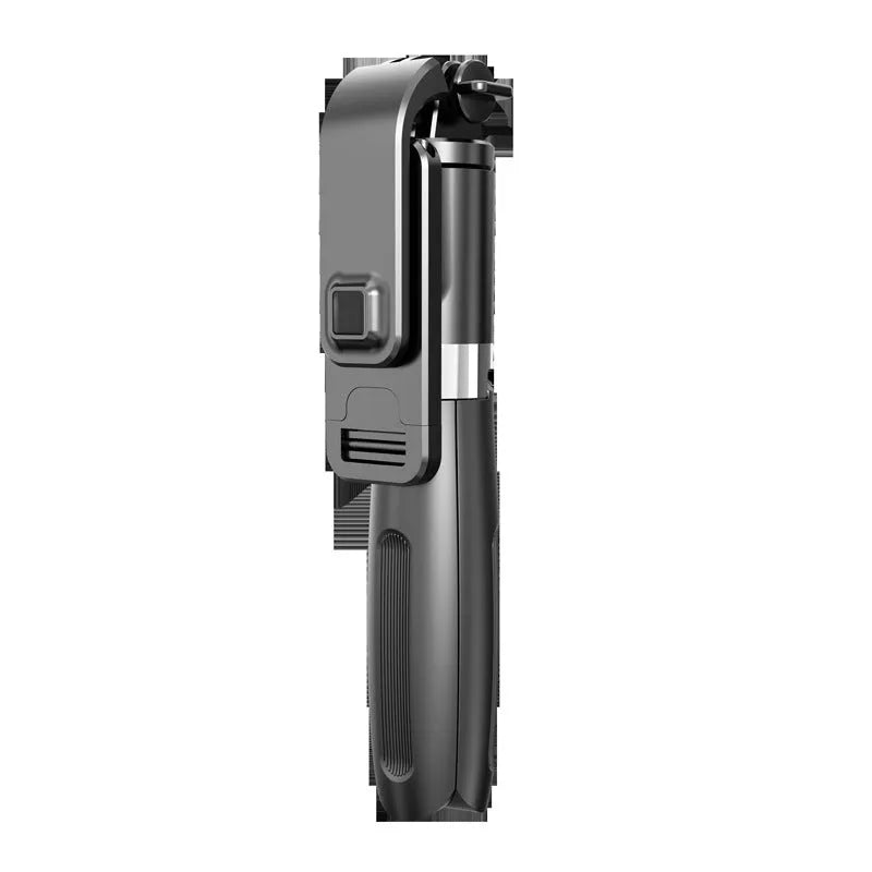 Black Bluetooth selfie stick extended to full length with smartphone attached and remote control in hand