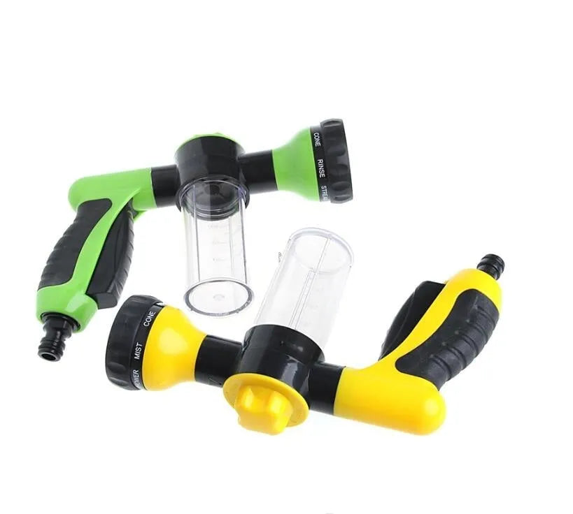 Green high pressure foam spray gun with multiple spray pattern settings and hose connection