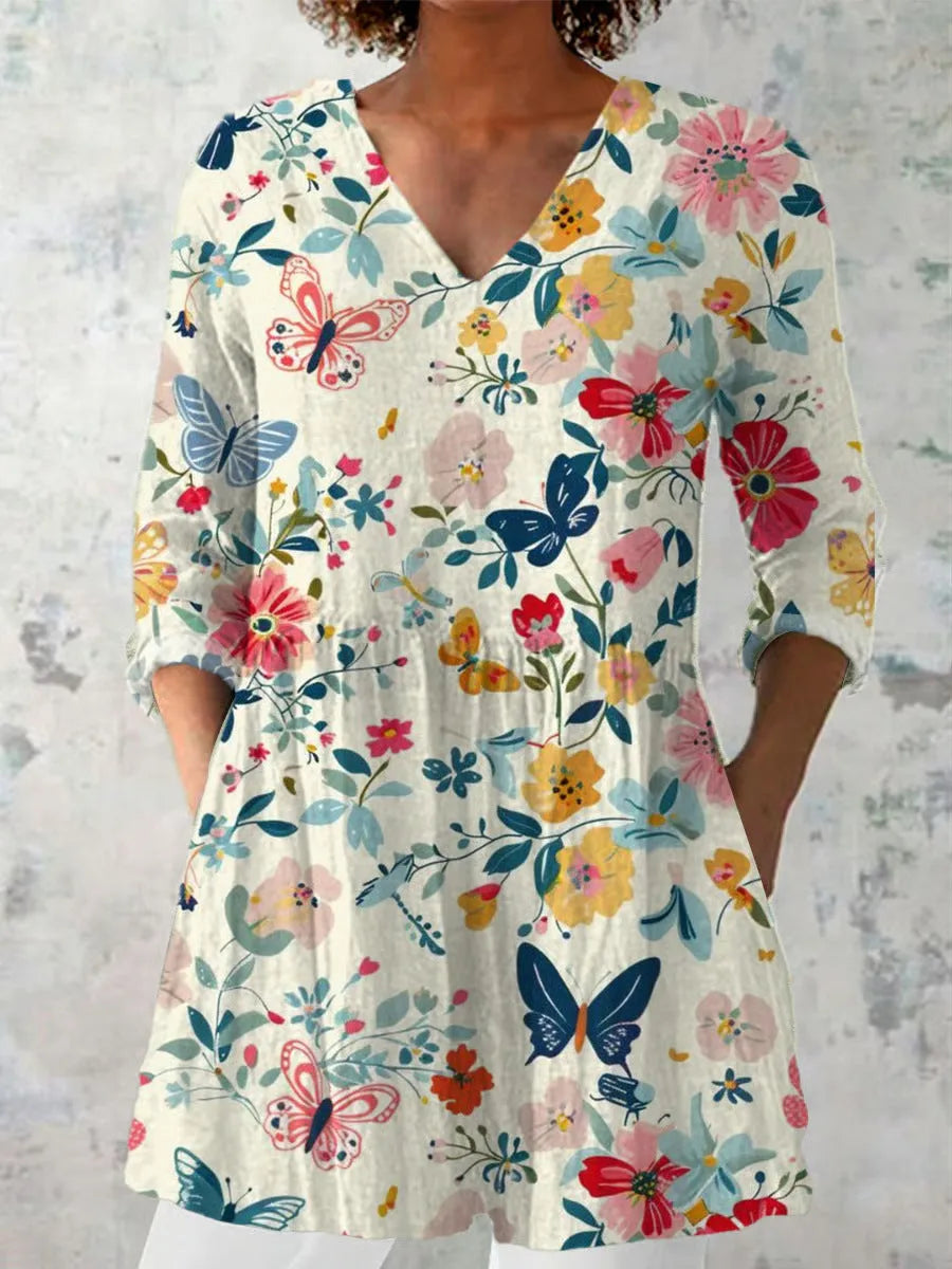 Women's retro style slim fit long sleeved top with a digital printed pattern.