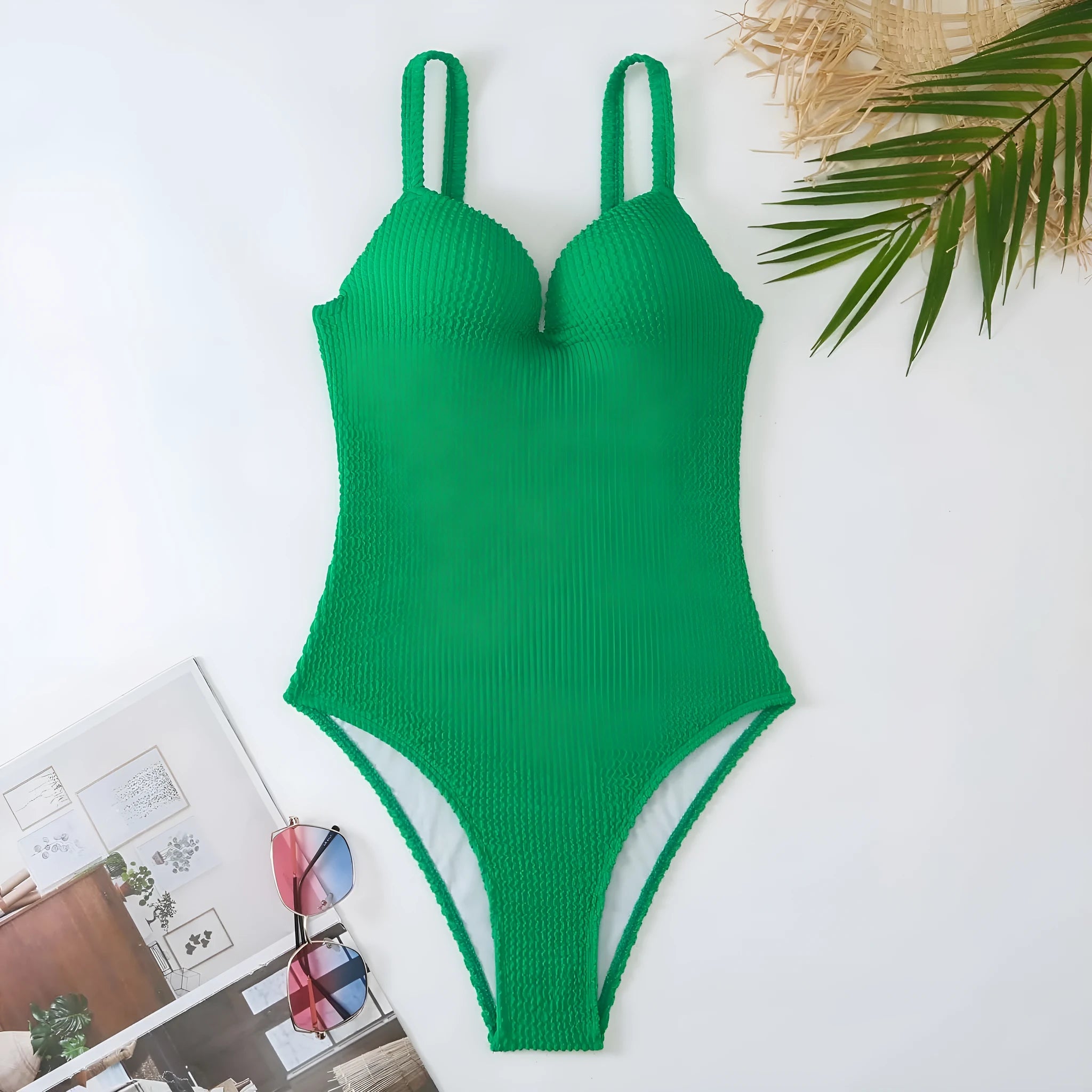 Women's one-piece swimsuit with sunken stripe pattern in polyester fabric available in multiple colours