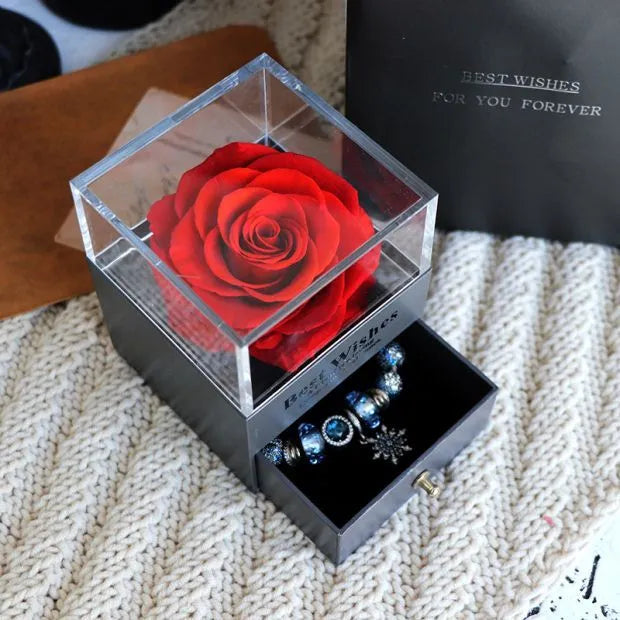 Eternal flower jewellery box with preserved roses and carnations in 8.5cm glass cube display