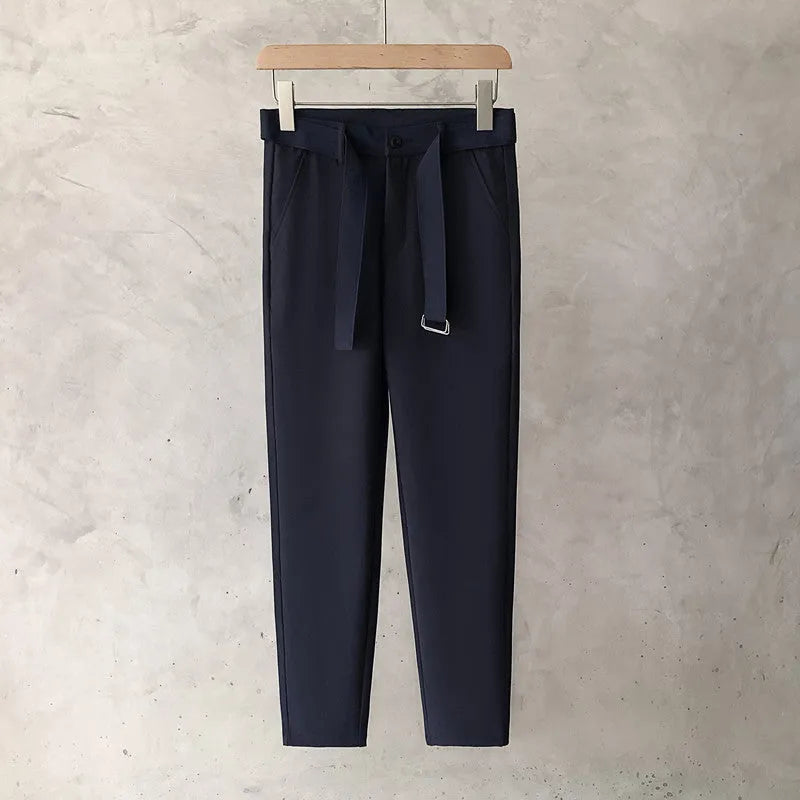 Boys slim straight wool trousers in grey, showing tapered fit and straight leg opening.