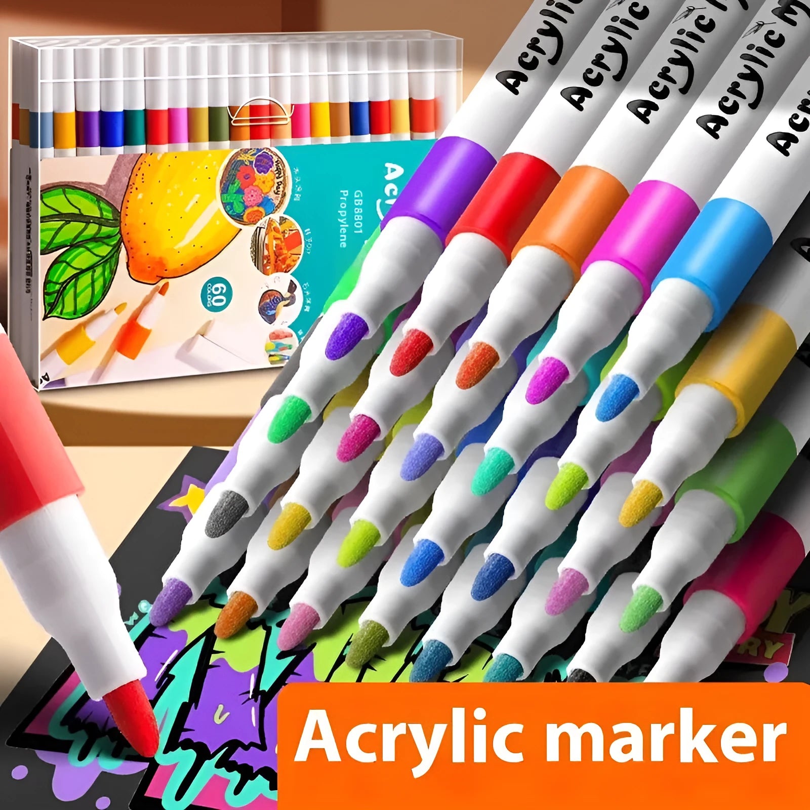 Box of multicoloured acrylic marker pens for student painting, showing plastic pen casings.