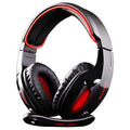 Black SADES SA902 wired USB gaming headset with over-ear cups and adjustable headband on a desk