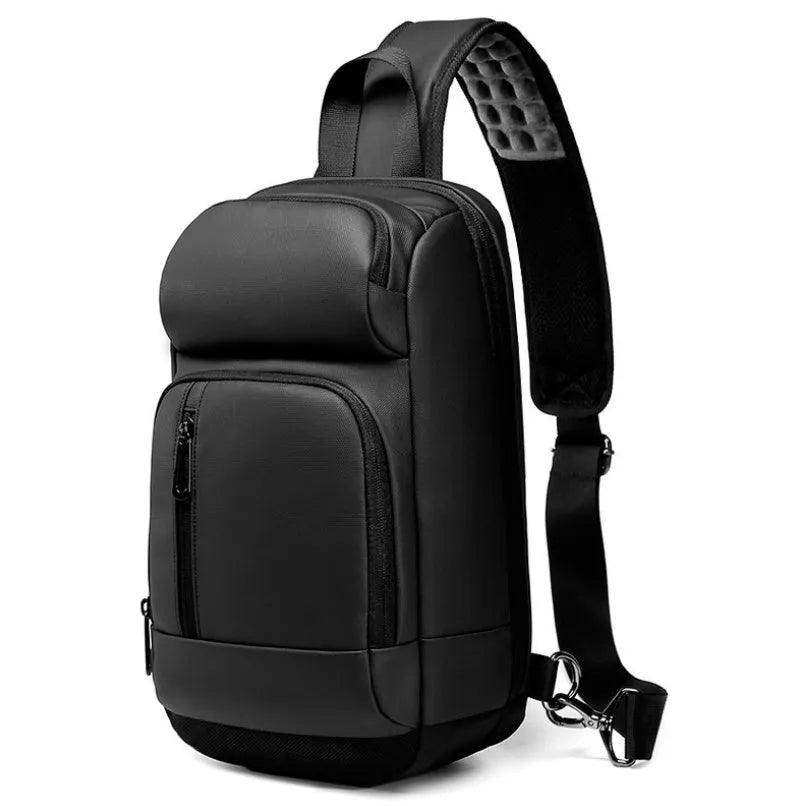 Black PVC outdoor shoulder bag with air cushion strap showing internal computer pocket and organisational compartments