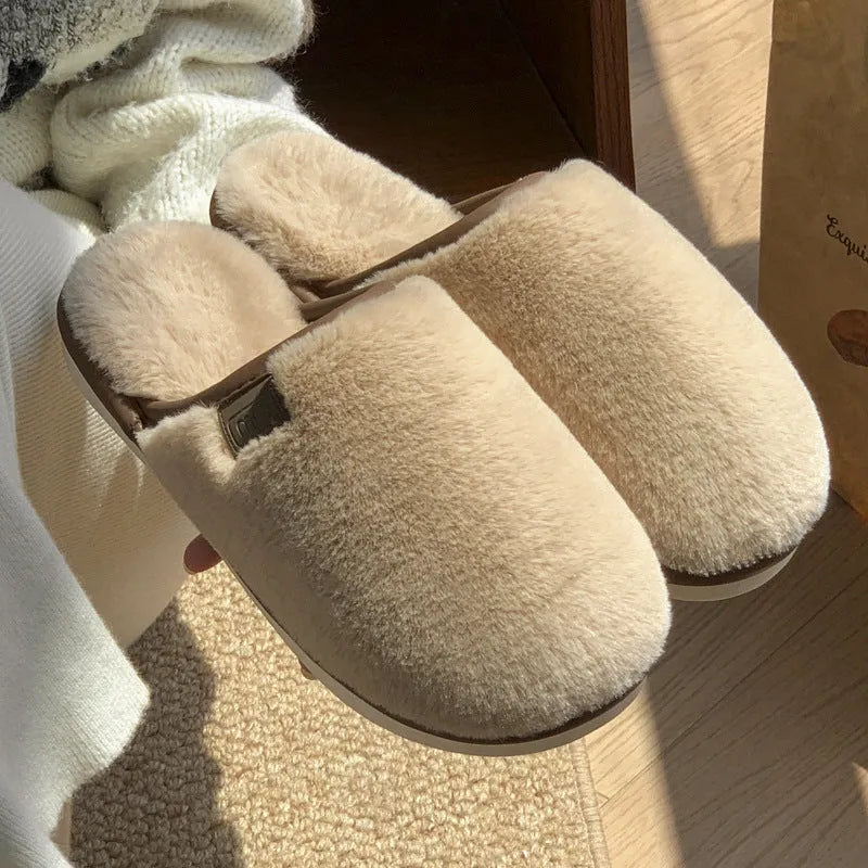 Solid-colour winter plush slippers with non-slip PVC sole on a home floor