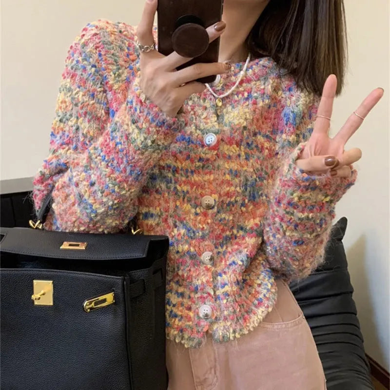 Pink or green acrylic knitted rainbow cardigan with regular sleeves and medium thickness