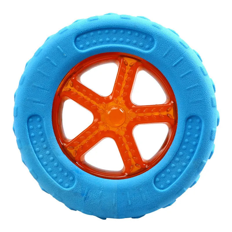 Three TPR floating dog toys: a ball, barbell, and tyre with bumpy textures for water fetch