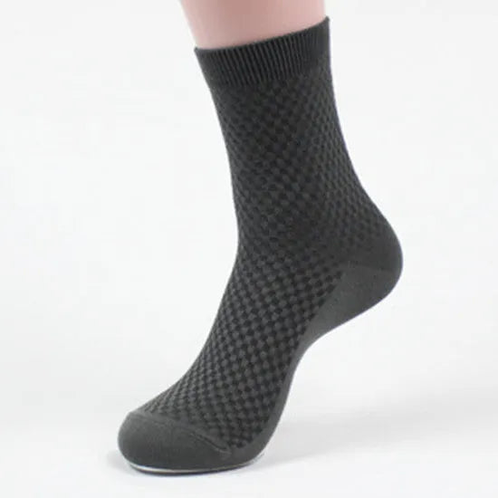 Men's bamboo fibre socks with a small square pattern in black, grey blue, iron grey, navy blue, and silver grey.