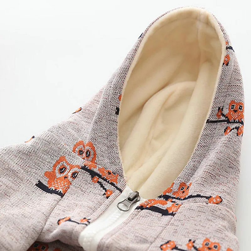 Blue casual dog sweater with front zipper and animal print, shown on a model dog.
