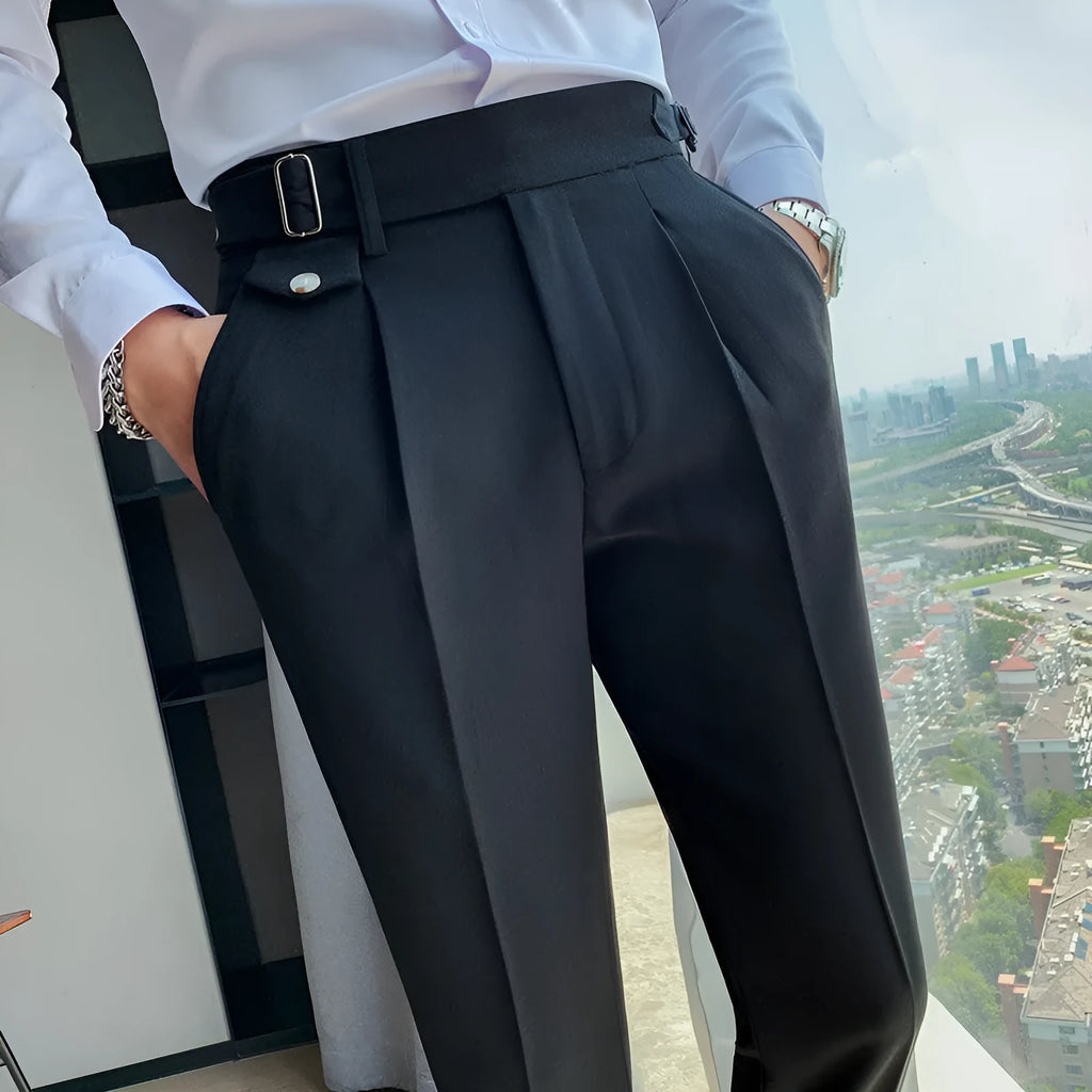 Men's straight-leg casual trousers in solid colours like black, grey, and khaki.