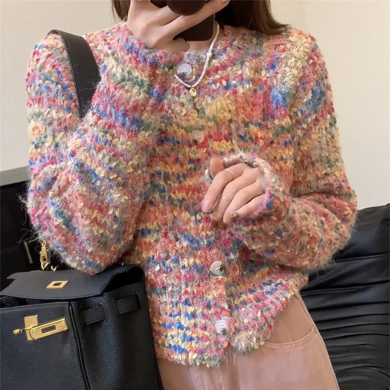 Pink or green acrylic knitted rainbow cardigan with regular sleeves and medium thickness